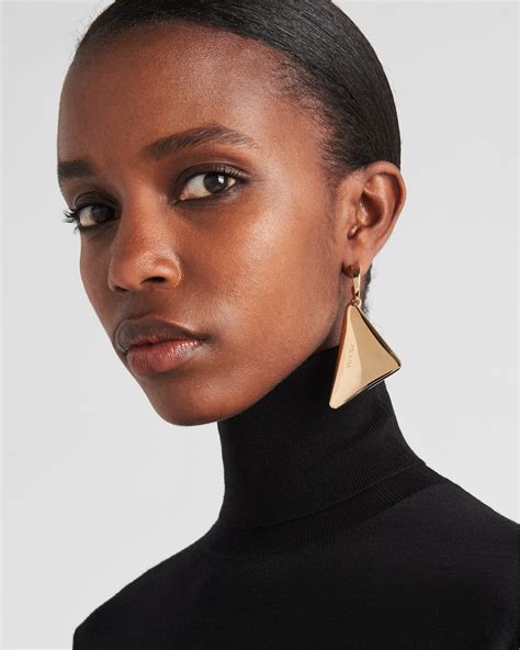 gold prada earrings|prada earrings men.